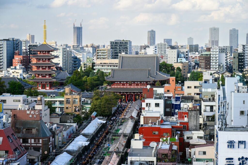 A view of a city with a train on the tracks